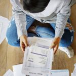 A person viewing a utility bill